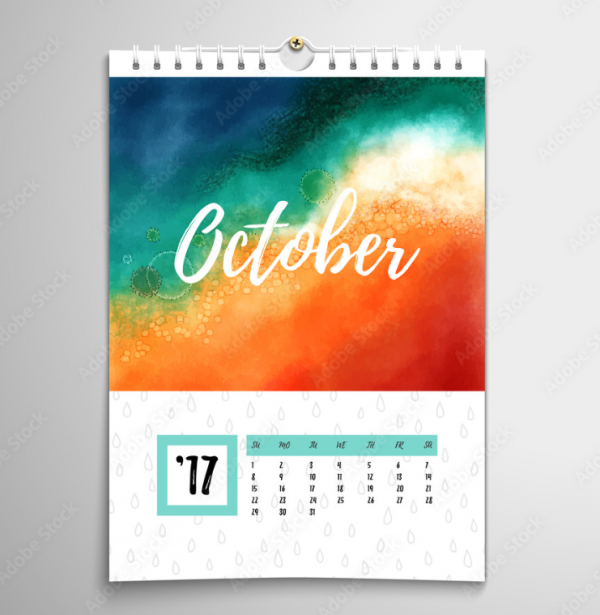Kalender spiral dengan ilustrasi berwarna-warni